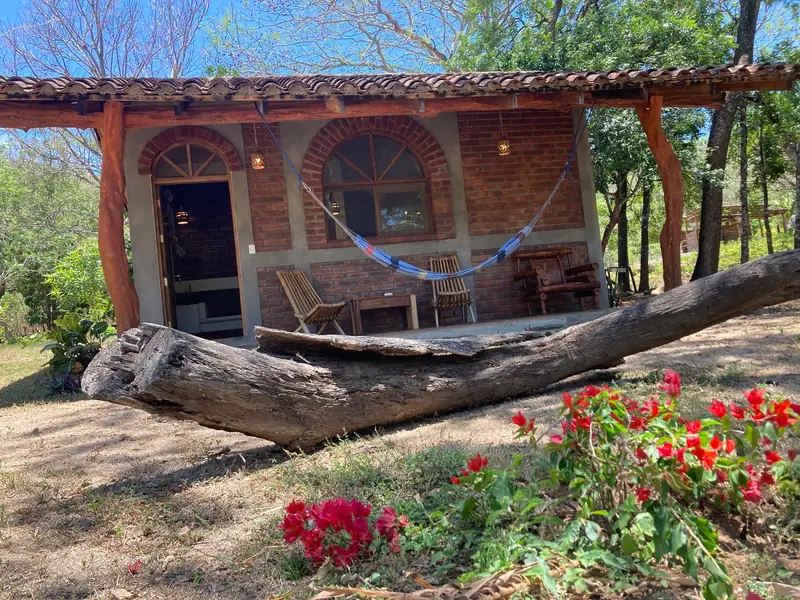 The porch of Casa Ladrillos with a hammock